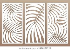 three panels with cut out leaves on them, in the style of paper art stock photo