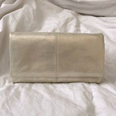 Like Brand New- Authentic Hobo Champagne Wallet With Pull Out Handle. Used For Maybe Two Weeks. I Love This Sooo Much But My Husband Bought Me A Gift Of A Mew Bag And Matching Wallet. This Would Fit My Iphone 12 Max In The Center If Needed. Comes From An Extremely Clean, One Pup Home. Hobo Bags, My Iphone, Champagne Gold, Gold Leather, My Husband, Iphone 12, Leather Wallet, Champagne, Bag Lady