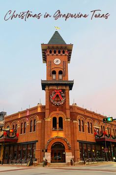 an old brick building with a clock tower on top and the words christmas in traverse texas above it