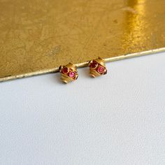 Estate/ vintage 18KT yellow gold ornate Indian Byzantine design earring charms with genuine rubies. Genuine, cabochon, rubies on each charm, bezel set. (7) rubies per charm Length: 10mm Width: 10mm Weight: 2.3 Grams per pair Not stamped, but tested and guaranteed 18KT No hoop earrings included Excellent used condition, may have never be used Elegant Charms Earrings For Anniversary, Red Byzantine Jewelry As Gift, Red Byzantine Style Jewelry Gift, Gold Earrings With Ruby Gemstone, Gold Ruby Earrings With Gemstone, Gold Earrings With Ruby Birthstone, Classic Gold Ruby Earrings, Red Byzantine Jewelry Gift, Gold Ruby Gemstone Earrings