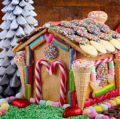 an elaborate gingerbread house decorated with candy and candies