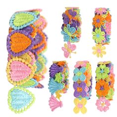 several colorful bracelets with flowers and butterflies on them