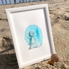 a painting of a snowman in the sand with a seashell on the beach