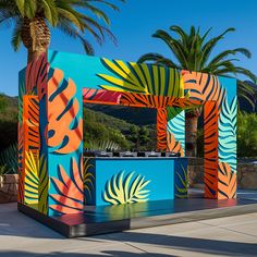 colorfully painted outdoor bar with palm trees in the background