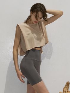 Composition : POLYESTER 85% + POLYURETHANE 15%Country of Origin : KOREA Versatile Beige Stretch Top, Stretch Taupe Tops For Summer, Taupe Stretch Tops For Summer, Taupe Fitted Sleeveless Top, Fitted Taupe Sleeveless Top, Fitted Sleeveless Taupe Top, Beige Athleisure Tops For Summer, Casual Beige Workout Tops, Brown Summer Workout Tops