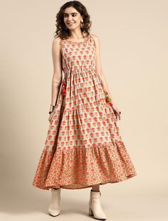 *This dress offerings will take your personal style to new heights. Wear this hand printed piece with ballerinas and your favourite sweater for a cute and laid-back date look Indian Anarkali / Indian Spring Dress / Plus Size Cotton Maxi Dress / Midi Dress :Hand Block Printed Kurti: * Printed Tie-Ups Tiered Fit & Flare Ethnic Dress * Beige and red ethnic motifs printed maxi dress, round neck, sleeveless, tie-ups detail, tiered, flared hem AVAILABLE IN 6 SIZES THEY ARE IN FOLLOWING MEASUREMENTS IN INCHES:- XS:- Bust-34/Waist-30/Hip-36/Length-52 S:- Bust-36/Waist-32/Hip-38/Length-52 M:- Bust-38/Waist-34/Hip-40/Length-52 L:- Bust-40/Waist-36/Hip-42/Length-52 XL:- BUST-42/Waist-38/Hip-44/Length-52 XXL:- Bust-44/Waist-40/Hip-46/Length-52 :Pattern:- Hand Printed :Fabric:- Pure Cotton  : Sleeve:- Traditional Tunic Maxi Dress With Block Print, Festive Ankle-length Block Print Dresses, Spring Floor-length Block Print Dress, Kurti Long, Indian Spring, Beige Maxi Dress, Festival Block Print V-neck Maxi Dress, Maxi Dress Boho, Bohemian Block Print V-neck Maxi Dress