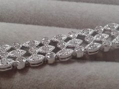 Very attractive Art Deco Revival link bracelet with multiple small round diamonds in round and marquis shaped settings. Marked spb which we believe is for silver plated brass, later 90s Y2K. B 178 Classic Silver Marquise Diamond Bracelet, Silver Marquise Jubilee Tennis Bracelet, Silver Marquise Diamond Cut Bracelet, Formal Silver Marquise Diamond Bracelet, Silver Diamond Marquise Bracelets, Silver Marquise Diamond Bracelet For Anniversary, Silver Marquise Diamond Bracelet Gift, Art Deco Revival, Art Deco Bracelet