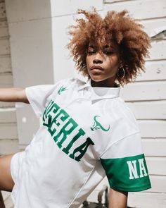 We’re still celebrating the launch of or refreshed Nigeria Baseball Jersey. We now have limited sizes available for immediate order (cause Naija really no day carry last 🇳🇬😜) but we’ve got preorders available so make your purchase! And to our new customers and followers, welcome to the MIZIZI fam! #StayRooted y’all! White Baseball Collar Top For Streetwear, White Team Logo Top For Streetwear, White Fan Apparel Baseball Jersey, White Top With Team Logo For Streetwear, White Short Sleeve Baseball Jersey For Sports Fans, White Tops For Baseball Season Streetwear, White Streetwear Top With Team Logo, White Baseball Jersey With Collar For Fans, White Sports Fan Top With Baseball Collar