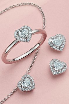 Embrace the romance with De Beers. #debeers #thehomeoflove #heartshapeddiamond De Beers Jewelry, Diamond Gifts, Heart Pendent, Necklace Combo, Diamond Earrings Design, Diamond Necklace Designs