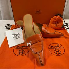 Authentic Hermes Mules, Iconic Orange Leather, Silver Tone H Hardware, Kitten Heels, Preowned, Regular Sign Of Wear, Very Good Condition, Come With 2 Dust Bag, Replacement Tap And Box Hermes Mules, Elegant Orange Pointed Toe Heels, Designer Orange Pointed Toe Heels, Orange Leather Open Heel Mules, Luxury Orange Pointed Toe Heels, Red Pointed-toe Kitten Heels With Sculpted Heel, Hermes Orange, Hermes Shoes, Orange Leather