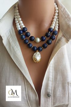 A timeless accessory that embodies natural beauty, our elegant Pearl and Lapis Lazuli Necklace combines lustrous freshwater pearls, known for their lustrous and iridescent appeal, with the deep blue appeal of genuine Lapis Lazuli gemstones. Handmade with love and attention to detail, this stunning necklace exudes a sense of opulence and elegance. Elegant Handmade Double Strand Crystal Necklaces, Elegant Handmade Double Strand Crystal Necklace, Elegant Beaded Necklaces With Stones For Gift, Exquisite Gemstone Bridal Necklace, Elegant Stone Necklace For Anniversary, Elegant Beaded Pendant Necklace With Stones, Formal Gemstone Beads Necklace, Elegant Pendant Beaded Necklace With Stones, Elegant Crystal Necklace With Stones For Gift