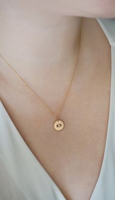 18K 14K 9K Dainty Diamond Evil Eye Necklace, Minimalist Small Evil Eye Charm Necklace, Solid gold layering necklace, Lucky charm, Gift for Her, Gift for mom, Kabbalah Jewelry, FREE EXPRESS SHIPPING Dainty, minimalist solitaire diamond evil eye charm necklace with a unique design and made in 18K, 14K or 9K gold. An absolute staple! Whisper...My new Lucky charm! ------------------------------------------------- D E T A I L S 18K, 14K or 9K Solid Gold Disc size: 12mm/ approx. 0.47'' Natural white d Dainty Recycled Gold Necklaces, Gold Delicate Birthstone Necklace For Everyday, Delicate Gold Birthstone Necklace For Everyday, Delicate 14k Gold Charm Necklaces For Everyday, Everyday Delicate 14k Gold Charm Necklaces, Delicate 14k Gold Charm Necklace For Everyday, Dainty Gold Round Pendant Birthstone Necklace, Delicate Round Charm Necklaces In 14k Gold, Dainty Charm Necklace With Delicate Chain In Recycled Gold