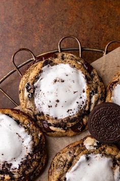 chocolate chip cookies with white cream and oreo cookies