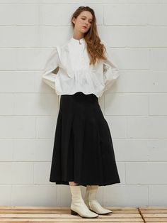 Editor's NotesClassic pleats create graceful movement and voluminous.- Zipper detail on waist- Stretchy material with feminine silhouette- Sophisticated mood with a flare fitMeasurements(in.)Size S / M- Total length: 34.25 / 34.25 in.- Waist: 28.34 / 29.52 in.- Hip: 36.22 / 37.79 in.- Hem: 85 / 85.82 in.*Model info: Height: 5'7'' / Bust: 30.31 in. / Waist: 22 in. / Hip: 35.43 in.*Depending on measurement method  may differ 1/3'Composition & Care78% Polyester  18% Rayon  4% PolyurethaneLining Elegant A-line Pleated Skirt For Daywear, Flared Ruffle Skirt For Work, Ruffled Flared Skirt For Work, Chic Pleated Ruffled Flowy Skirt, Elegant Pleated Skirt Bottoms For Daywear, Elegant Pleated Flared Skirt For Daywear, Elegant Daywear Pleated Skirt, Elegant Pleated Skirt For Daywear, Elegant Full Pleated Skirt For Daywear