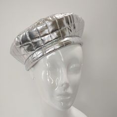 All that glitters is not necessarily gold. Step out in style in this shining star. The Silver Quilted Beret features a coordinating silver and black cotton lining.  Size: Medium/22 inches around band Handcrafted in Illinois by a trained milliner Shining Star, Berets, All That Glitters, Wedding Shop, Black Cotton, Illinois, Accessories Hats, Accessory Gift, Electronic Accessories