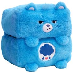 CARE BEARS: 10" MUSHMILLOWS CUBES - GRUMPY BEAR - Happy Nappers Care Bears Mushmillows Cubes bring to life a new world of collectible fun. Transform from a compact 10-inch cube to a spacious 5 x 10 x 20 inch pillow with ease. Perfect for versatile play and relaxation. Use your Mushmillow as a chair, pillow, footrest, or play mat. Ideal for various activities and adding comfort to any space. Colorful characters and compact cube design make a fun stackable plush toy to collect and share. Colorful Bear Personality, Happy Nappers, Grumpy Bear, Kids Climbing, Kids Throw Pillows, Soft Play Equipment, Play Cube, Bear Character, Playful Decor