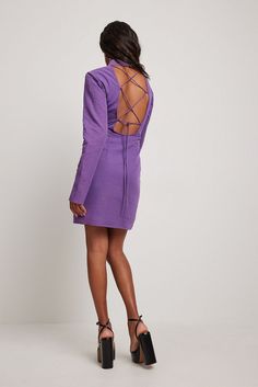 This mini dress is long-sleeved and features a high neckline, a ruched cup detail, an open back with lacing and a button closure behind the neck and a structured material with lining. Open Back Mini Dress, Open Back Dress, Purple Mini Dresses, Dress Linen, Open Back Dresses, Dress Purple, Future Fashion, Back Dress, Linen Dresses