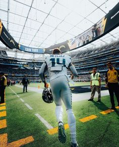 a football player is running on the field