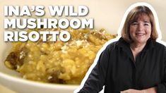 a woman standing in front of a bowl of food with the words ina's wild mushroom risotto