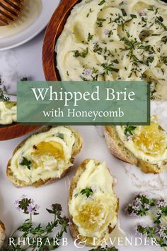 whipped brie with honeycomb in a wooden bowl on a white table next to bread