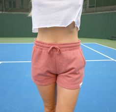 Made fresh when you order for human friendly and environmental reasons. Our Women's Shorts are super soft, casual, and extremely comfortable. The unique fabric is garment washed to bring you a one of a kind look and feel. Made with our premium cotton/polly blend to achieve the perfect balance of comfort and fit. Best paired with our matching crop tops! Specs 55% ring-spun cotton 45% polyester garment washed that gets softer as you wash them 2 jersey lined side pockets Elastic waistband with shoe Pink Shorts, Mix N Match, Cropped Hoodie, Dusty Rose, Pink Ladies, Womens Shorts, Crop Tops, Human, Fabric