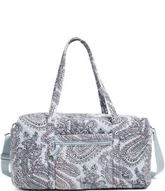 From Vera Bradley&#x2C; the Soft Sky Paisley Large Travel Duffle Bag features: Going home for a long weekend or out on a girls' adventure getaway? This duffel will help you pack it all in style. Interior pockets keep your cosmetics&#x2C; flat irons&#x2C; and socks all sorted. The exterior pockets keep boarding passes&#x2C; reading material&#x2C; or snacks close by.Exterior features one zip and three slip pockets.Interior features three Vera Bradley Duffle Bag, Boarding Passes, Flat Irons, Meaningful Beauty, Travel Duffle Bag, Travel Duffle, Duffle Bag Travel, Reading Material, Going Home