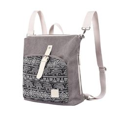 Aretha Canvas Backpack is an incredible bag thanks to its removable and adjustable straps. It can be transformed from a backpack to a crossbody bag in a fraction of a second. Its bohemian design on the front pocket makes it also fabulous. This charming style complements any outfit. The Aretha Canvas Backpack has a large storage capacity. Its large main compartment can hold a 13-inch laptop, tablet, and other daily essentials. The Aretha Canvas Backpack also has a large front pocket and two large Gray Backpack Shoulder Bag, Bohemian Tote Backpack For Daily Use, Bohemian Backpack For Everyday Use, Bohemian Tote Backpack With Adjustable Strap, Bohemian Satchel Backpack For Everyday Use, Bohemian Everyday Backpack With Adjustable Strap, Trendy Gray Backpack With Adjustable Strap, Trendy Gray Backpack Shoulder Bag, Trendy Gray Backpack For Everyday Use