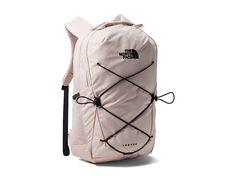 The North Face Women's Jester Backpack - Backpack Bags : Pink Moss/TNF Black : While others are fumbling around looking for their stuff, you'll have the last laugh with the updated style, women-specific design, and superior organization of The North Face Jester Backpack. Large main compartment fits books and binders. Protective padded laptop sleeve fits devices up to 15. Updated front organization panel simplifies organization with essential storage features including secure-zip pockets, a table North Face Jester Backpack, The North Face Jester, Jester Backpack, North Face Jester, North Face Bag, School Bag Essentials, Women Backpack Fashion, The Last Laugh, Backpack Reviews