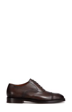 Crafted with flexible, lightweight Blake construction, this Italian-made oxford with a richly polished finish pairs classic elegance with contemporary flair. Lace-up style Leather upper and lining/leather and synthetic sole Made in Italy Men's Designer Shoes Elegant Fitted Derby For Semi-formal Occasions, Elegant Wingtip Oxford Shoes For Derby, Elegant Wingtip Oxford For Derby, Elegant Wingtip Oxfords For Derby, Classic Oxfords For Derby, Elegant Goodyear Welted Oxford Shoes For Semi-formal Occasions, Elegant Oxford Shoes With Brogue Detailing For Business Casual, Elegant Semi-formal Goodyear Welted Oxford Shoes, Elegant Wingtip Oxford For Business