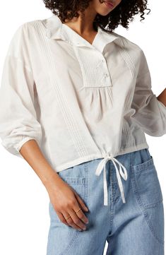 Slim pintucks add flattering dimension to an all-cotton blouse further elevated by an embroidered placket and an adjustable drawstring-tied hem. Stand collar Three-quarter sleeves with one-button cuffs 100% cotton Dry clean Imported Pintuck Blouse, Long Sleeve Cotton Tops, Blouse Nordstrom, Designer Crossbody Bags, Sweaters And Leggings, Cotton Blouse, Designer Clothes For Men, Denim Jumpsuit, Pin Tucks