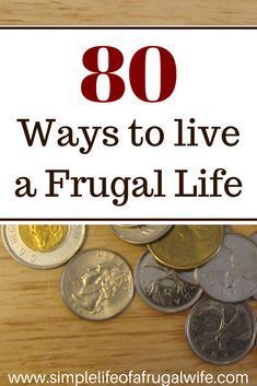 a pile of coins sitting on top of a wooden table with the words 80 ways to live a frugal life