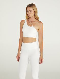 One bra, two ways. The One Shoulder Convertible Bra Top is cut from our exclusive Melt fabric, offering a second-skin fit with a buttery-soft feel. This sleek sports bra features an adjustable strap that can be worn over the shoulder or asymmetrically. Versatile White Sports Bra With 4-way Stretch, Versatile White Sports Bra, White Activewear With Removable Bra Pads, White Adjustable Straps Yoga Bra, White Yoga Bra With Adjustable Straps, Compressive White Sports Bra With Removable Pads, Versatile Sports Bra With Built-in Bra And 4-way Stretch, White Athleisure Bra With Removable Pads, White Workout Bra With Adjustable Straps