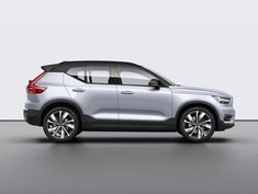 the new volvo suv is shown in an empty studio space with no one around it