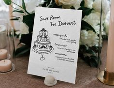 a table with a card that says save room for dessert next to candles and flowers