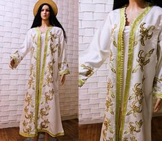 Elevate your style with our exquisite white vintage Moroccan kaftan, adorned with delicate floral embroidery. This classic piece is complemented by a stunning white vintage cape, creating a timeless and elegant combination. Whether you're preparing for a special occasion or just want to infuse your wardrobe with Moroccan charm, this ensemble captures the essence of tradition and sophistication. Be the epitome of grace and style in this unique and versatile outfit, perfect for any event or everyday elegance. measurements  bust : 106cm/41'' length:130/51'' would fit S and M White Festive Kaftan For Spring, White Festive Spring Kaftan, Festive White Kaftan For Eid, Festive White Kaftan, Elegant Floral Embroidered Kaftan For Spring, Elegant Spring Kaftan With Floral Embroidery, White Intricately Embroidered Festive Kaftan, Summer Wedding Kaftan With Floral Embroidery, Festive White Intricately Embroidered Kaftan