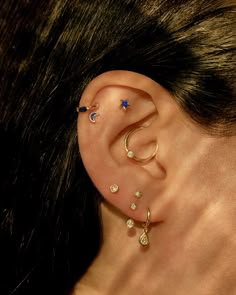 ear piercings on the model Simplistic Piercings, Cute Ear Piercings Impuria Ear Piercing Jewelry, Different Lobe Piercings, Dainty Lobe Piercings, Micro Lobe Piercing, Lope Piercings, Small Lobe Piercing, Layered Lobe Piercings, Gold Piercing Jewelry