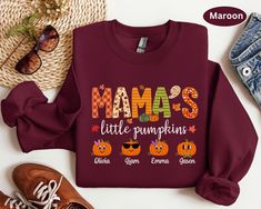 Custom Mama's little pumpkins Sweatshirt has a loose fit for a comfortable feel. Super soft cotton and excellent quality print make one to fall in love with it over and over again. Personalized Mama Fall Sweatshirt, Gift for Mama, Mama Sweatshirt, Mom Autumn Hoodie FEATURES - Loose fit - 50% Cotton; 50% Polyester (Fibre content may vary for different colors) - Medium fabric (8.0 Oz/yd² (271.25 g/m - Sewn in label - Runs true to size CARE INSTRUCTIONS - Wash before first use. - Wash inside out with like colors. - Tumble dry or hang to dry. - Try not to iron directly over the design. Iron if necessary! OUR PROCESS & SHIPPING 3 to 5 Business days for us to print your shirt and double check that it's perfect. Please do note that shipping takes 1-5 business days (Usually, USPS takes 1-5 days). Long Sleeve Sweatshirt For Fall Gift, Casual Fall Hoodie With Name Print, Fall Letter Print Hoodie Gift, Fall Letter Print Hoodie As Gift, Fall Crew Neck T-shirt With Name Print, Cute Name Print Tops For Fall, Cute Tops With Name Print For Fall, Fall Cotton T-shirt With Name Print, Fall Graphic Print Sweater Gift