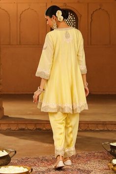 Lemon yellow silk chanderi short anarkali with kashmiri tilla and parsi gara embroidery. Comes with satin silk salwar and a silk organza dupatta. - Aza Fashions Yellow Silk Churidar With Chikankari Embroidery, Yellow Bollywood Cotton Silk Churidar, Bollywood Style Yellow Cotton Silk Churidar, Yellow Georgette Churidar With Cutdana, Parsi Gara Embroidery, Short Anarkali, Gara Embroidery, Yellow Anarkali, Yellow Silk