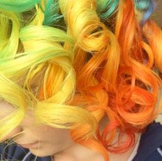 To maintain a healthy life style, make sure you get enough Vitamin C! @re_apple is providing a huge dose of the panacea here with her bright citrus-colored tendrils. Of course, for shades this vibrant, she used Manic Panic! To get her look, first be sure to bleach your hair to a level 9 or 10. Next, apply our Electric Banana for the yellow, Electric Lava for the orange, and Electric Lizard for the green. Food Color Hair Dye, Yellow And Peach Hair, Yellow To Orange Hair, Red Orange Yellow Hair, Yellow Vivid Hair, Organic Hair Oil, Hair Nutrients, Bleaching Your Hair