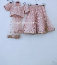 Product: Custom made girl kids dress. Size : All sizes possible. Price listed for dress for kids up to age 1-4 years. age 4-8 years. age 8-12 years. Fabric: Lehenga- net with sequins work all over Top -heavy embroidery net Dupatta - net embroidered Delivery Time : Please keep me informed for any dates or times frame you keeping in mind. Lehengas For Kids, Lace Choli For Diwali Party, Festive Lace Choli For Eid, Pink Party Wear Sharara With Self Design, Traditional Pink Lace Sets, Festive Pink Lace Set, Party Wear Lehenga With Chikankari Embroidery, Pink Party Wear Lehenga With Self Design, Festive Lace Lehenga For Navratri