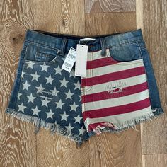 *Brand New* With Tags, “Others Follow” American Jean Shorts From Tilly’s. They Are A Size 26. Frayed Hem With Stars & Stripes Design On Front. Perfect For 4th Of July! Zipper And Button Closure. Waist Measures Approximately 14” From Side To Side. Measurement From Top Of Waist To Hem Is Approximately 10.5”. Comes From A Smoke Free Home. Retail Is $39.99 Orange Jeans, Usa Shorts, Camouflage Shorts, Retro Jeans, American Jeans, American Flag Print, Forever 21 Shorts, Star Jeans, Cut Off Jeans