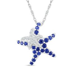 Honor motherly love in a whimsical way when you surprise Mom with this sweet blue and white lab-created starfish pendant in silver. Crafted in sterling silver The mama starfish glistens with graduated-size bright blue lab-created sapphires along her arms. Her baby - adorned with graduated-size white lab-created sapphires - shimmers atop to complete this playful look. This pendant suspends slightly askew along an 18.0-inch rope chain that secures with a spring-ring clasp. Ocean-inspired White Star Jewelry, Ocean-inspired White Star-shaped Jewelry, Blue Ocean-inspired Jewelry For Anniversary, White Star-shaped Ocean-inspired Jewelry, Elegant Blue Jewelry With Starfish Charm, Ocean-inspired Blue Jewelry For Anniversary, White Gold Sterling Silver Starfish Jewelry, Elegant Blue Starfish Charm Jewelry, Blue Sterling Silver Starfish Jewelry