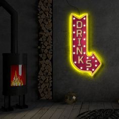 a neon sign that reads drink kes on the wall next to a fire place