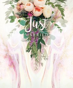 an artistic photo with flowers and the words just married