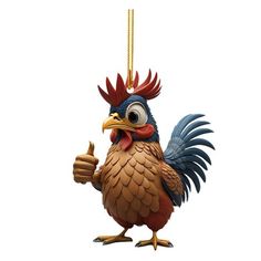 a christmas ornament with a rooster on it's head holding a thumb up