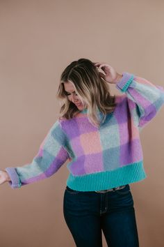 Our Gingham Pullover Sweater in a mesmerizing Jade multi-colorway. This sweater offers a fresh take on the classic gingham pattern with a blend of jade and other complementary hues. It's the perfect addition to your fall wardrobe, providing both style and comfort. Ribbed hem and collar mohair fabrication Gingham design Fabric: 100% Polyester Model Specs: Emily is wearing a size small in the photo.How will this item fit you? Check out our MODEL SPECS (Typical Sizing - Karli: S-Size 5/26 - 5ft 2in Cozy Plaid Sweater For Spring, Gingham Pattern, Everyday Chic, Design Fabric, Daily Activities, Chic Boutique, Long Hoodie, Fall Wardrobe, Vibrant Red