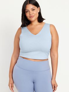 v-neck wide straps go-dry wicks moisture breathable fitted hits at natural waist provides light support for a-c cups models are approx.  5'9" and wear sizes s (4), l (12), and xl (18)machine wash according to the care instruction label V-neck Athleisure Top With Light Support, Athleisure V-neck Top With Light Support, V-neck Sports Bra With Light Support, Casual V-neck Activewear With Built-in Bra, Blue V-neck Activewear For Summer, V-neck Activewear With Medium Bust Support For Sports, Compressive V-neck Activewear With Light Support, Blue Yoga Tops With Medium Bust Support, Blue Top With Medium Bust Support For Yoga