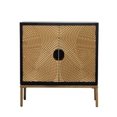 a black and gold cabinet with an intricate design