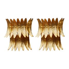 pair of gold - plated metal sculptural clip earrings, circa 1950