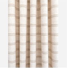 the back side of a curtain with beige and white stripes